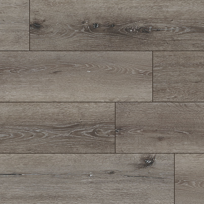 MSIs XL Cyrus Ludlow Luxury Vinyl Planks BOX (22.44 SQFT) features wide, greyish-brown planks with natural wood grain and knots, plus CrystaLux™-protected Rigid Core Flooring for a rustic look and long-lasting style.