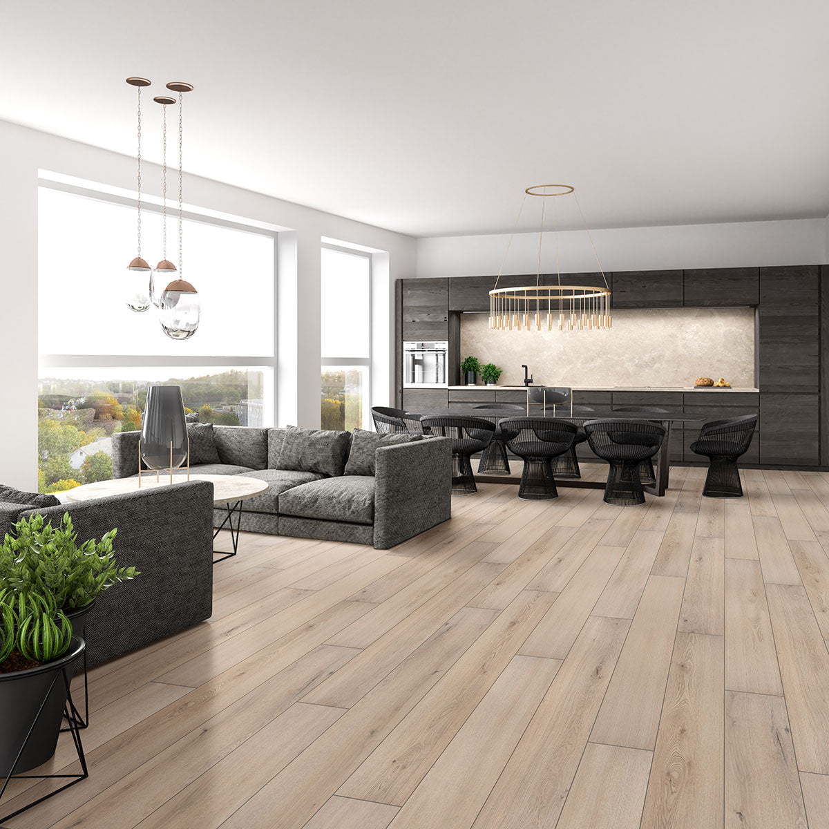Modern open-plan living room and kitchen with large windows, gray sectional, round coffee table, dark dining chairs, wood floors featuring MSI XL Cyrus Runmill Isle Luxury Vinyl Planks with CrystaLux Protection, potted plants, and sleek dark cabinetry.