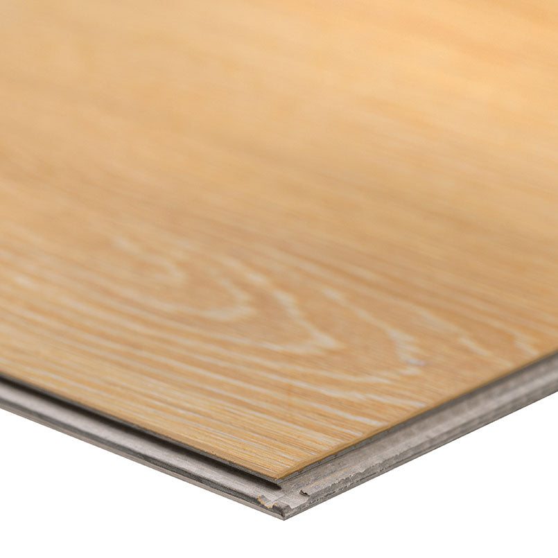 A close-up of MSI XL Cyrus Valleyview Grove Luxury Vinyl Planks BOX (22.44 SQFT) shows the light wood grain, interlocking edges, locking system, and the durable CrystaLux™ wear layer highlighting its premium quality.