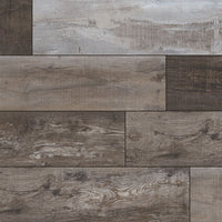 MSI XL Cyrus Weathered Brina Luxury Vinyl Planks feature rectangular XL planks in staggered layout, showcasing brown and gray tones with wood grain for a rustic, weathered look. Made from waterproof SPC for lasting durability. Each box covers 22.44 sq ft.