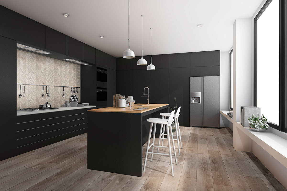 Modern kitchen with black cabinets, wooden countertops, center island with white barstools, stainless steel appliances, pendant lights, herringbone backsplash, large windows, and MSI XL Cyrus Whitfield Gray luxury vinyl plank flooring (waterproof wood-look).