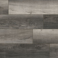 MSI XL Cyrus Bracken Hill Luxury Vinyl Planks feature rectangular rigid-core planks with a gray wood grain pattern, textured for a natural look. The waterproof flooring comes in a box covering 22.44 sq ft and offers long-lasting durability.